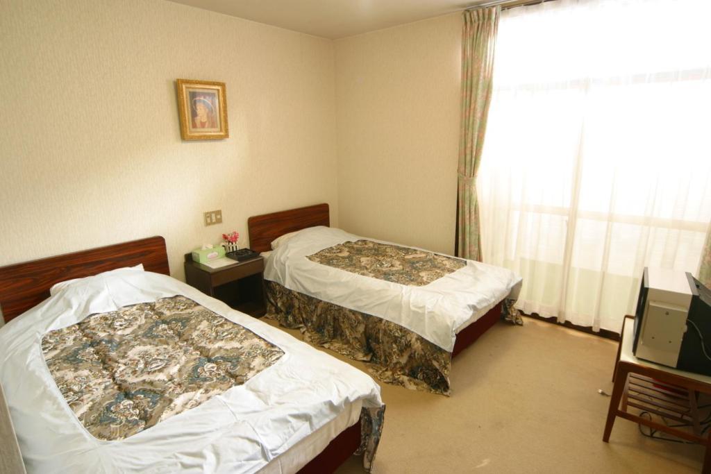 Hotel New Bernina Nagano Habitación foto